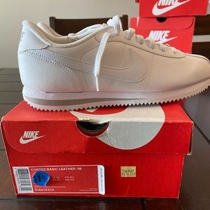 White with taupe Nike cortez